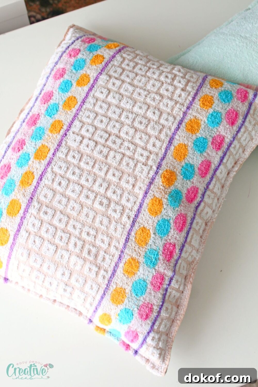 A cozy cat bed made from a towel. Sew one in 10 min - easy steps for a custom spot that matches your home décor!