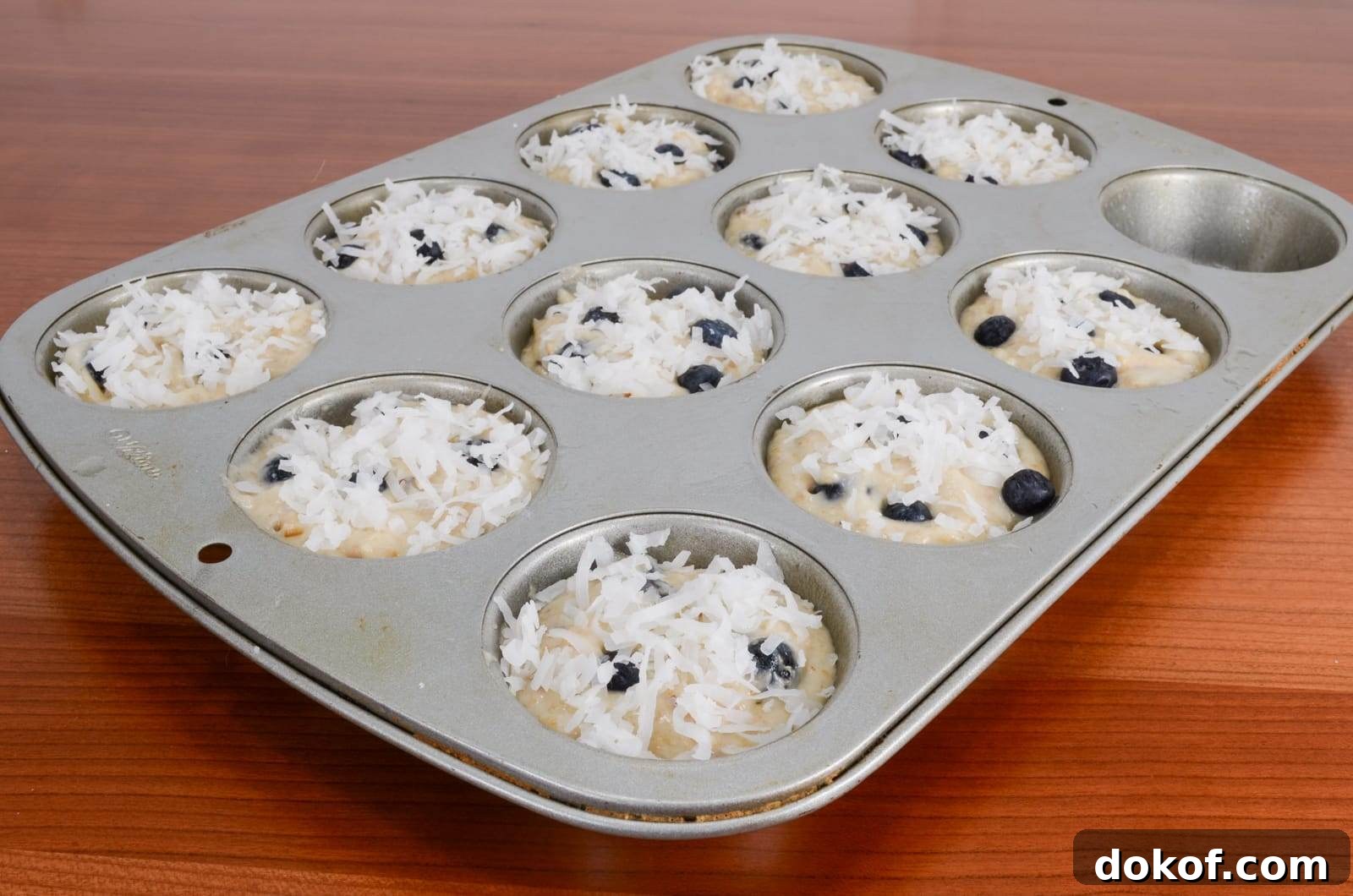 Toasted Coconut Blueberry Muffins with Crisp Coconut Topping 4 Toasted Coconut and Blueberry Muffins