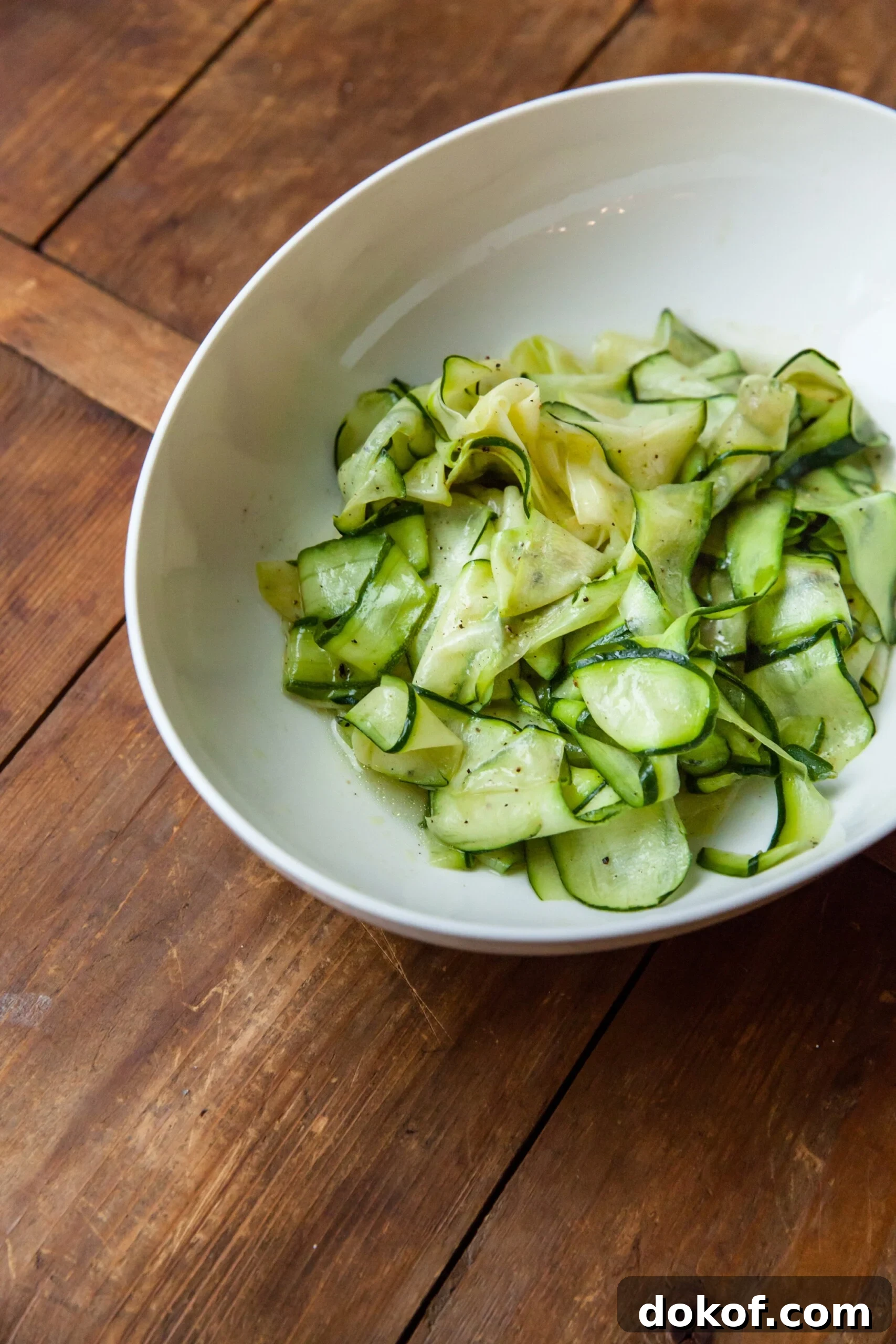Thin slices of zucchini forming a Zucchini Ribbon Salad.