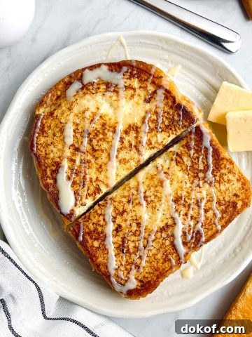 plate of hong kong french toast drizzled with condensed milk