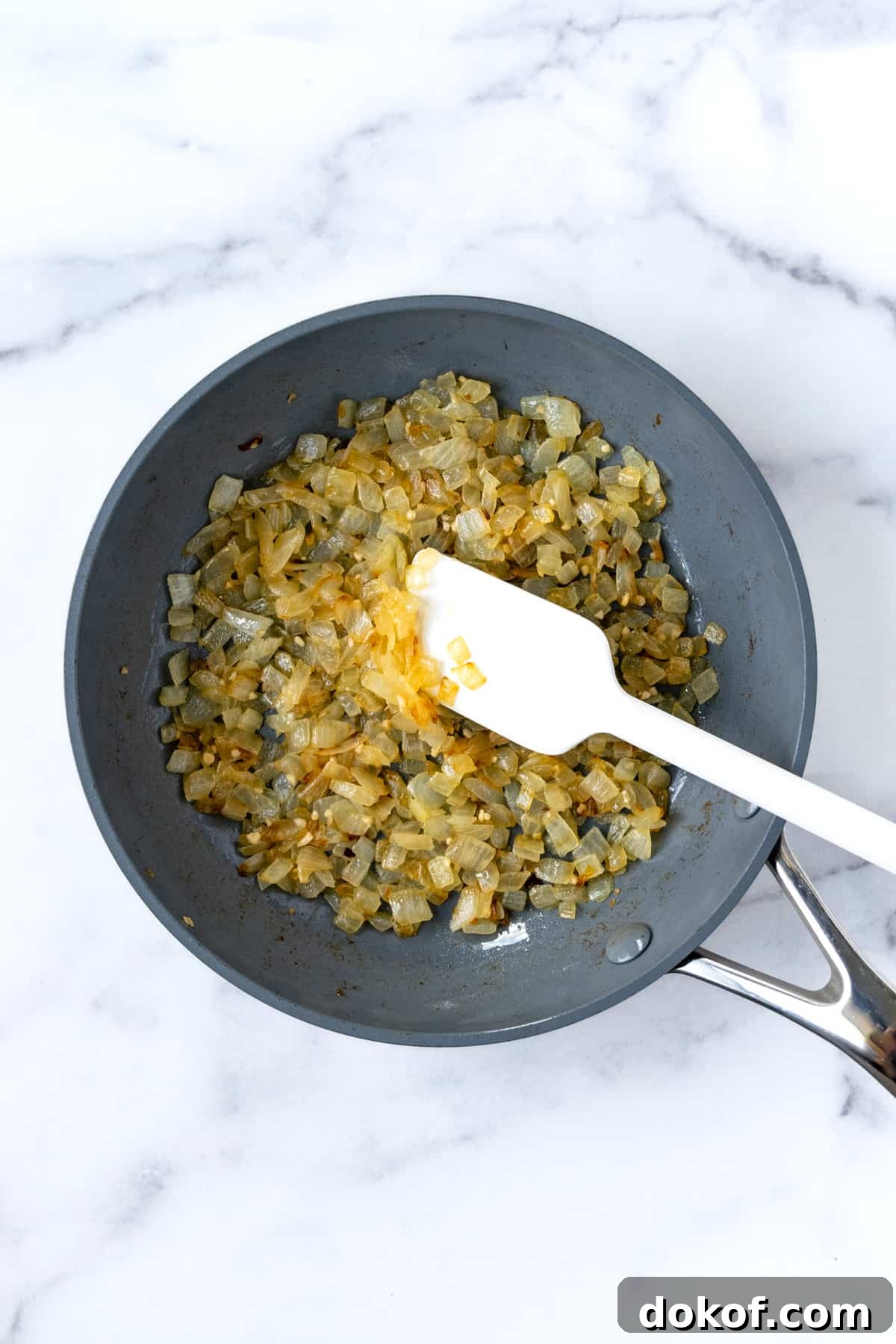 Caramelized Diced Onions in a small skillet.