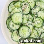 Close up of lemon cucumber salad (featured image).