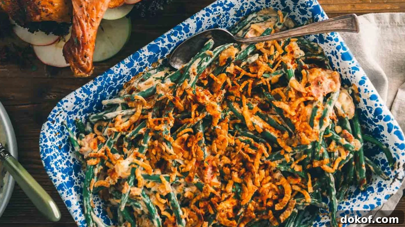 Creamy keto green bean casserole with a golden, bubbly topping.